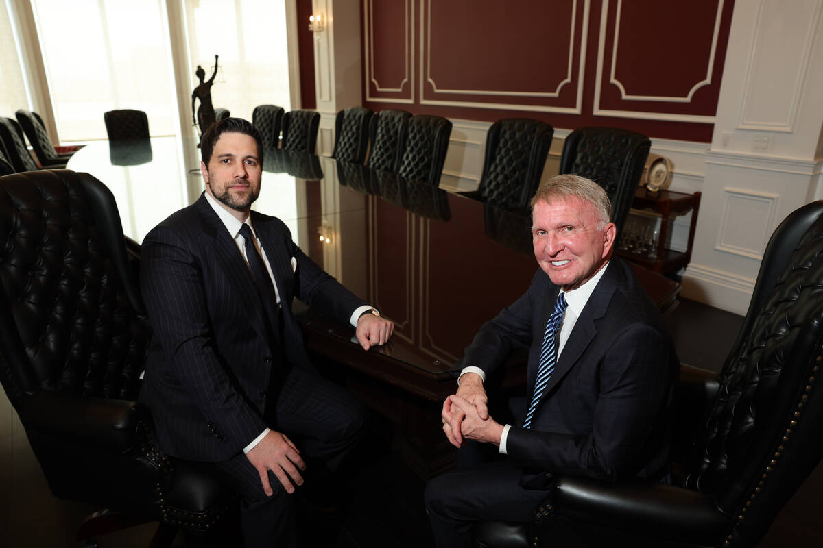 Steve Dimopoulos, left, and Robert Eglet pose for a photo at the office building Dimopoulos rec ...
