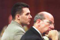 Ronald Mortensen and his attorney, Frank Cremen, look at jurors as they are polled following th ...