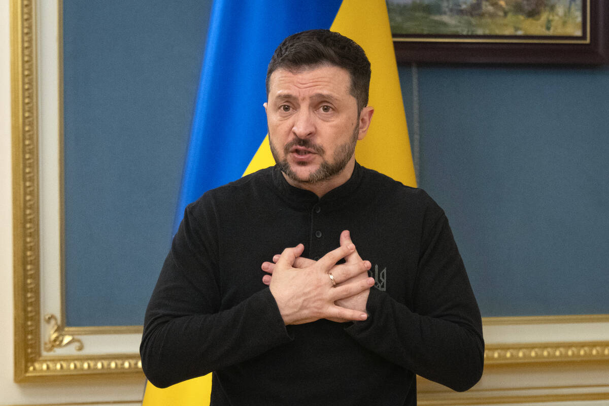 Ukrainian President Volodymyr Zelenskyy speaks during a briefing in Kyiv, Ukraine, Tuesday, Mar ...