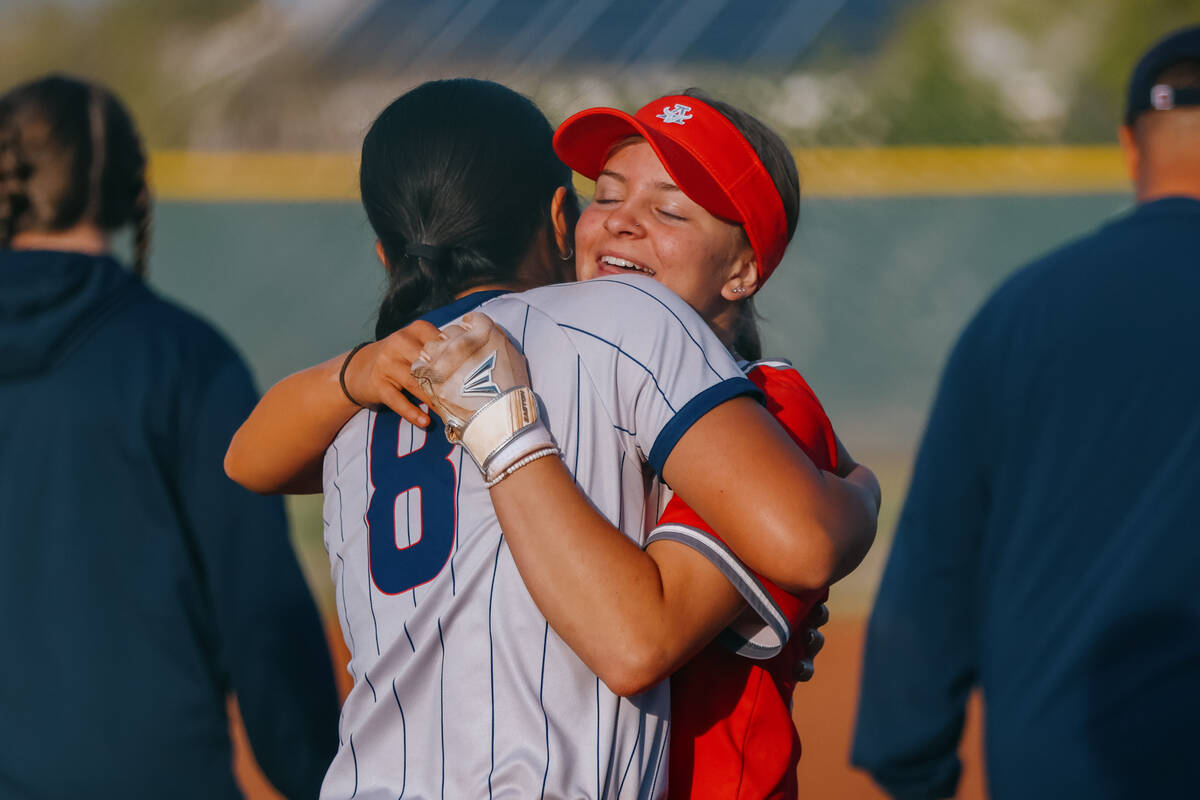 Coronado’s Alohi Mundon (8) and Arbor View’s Lilly Easton (55) embrace at the end ...