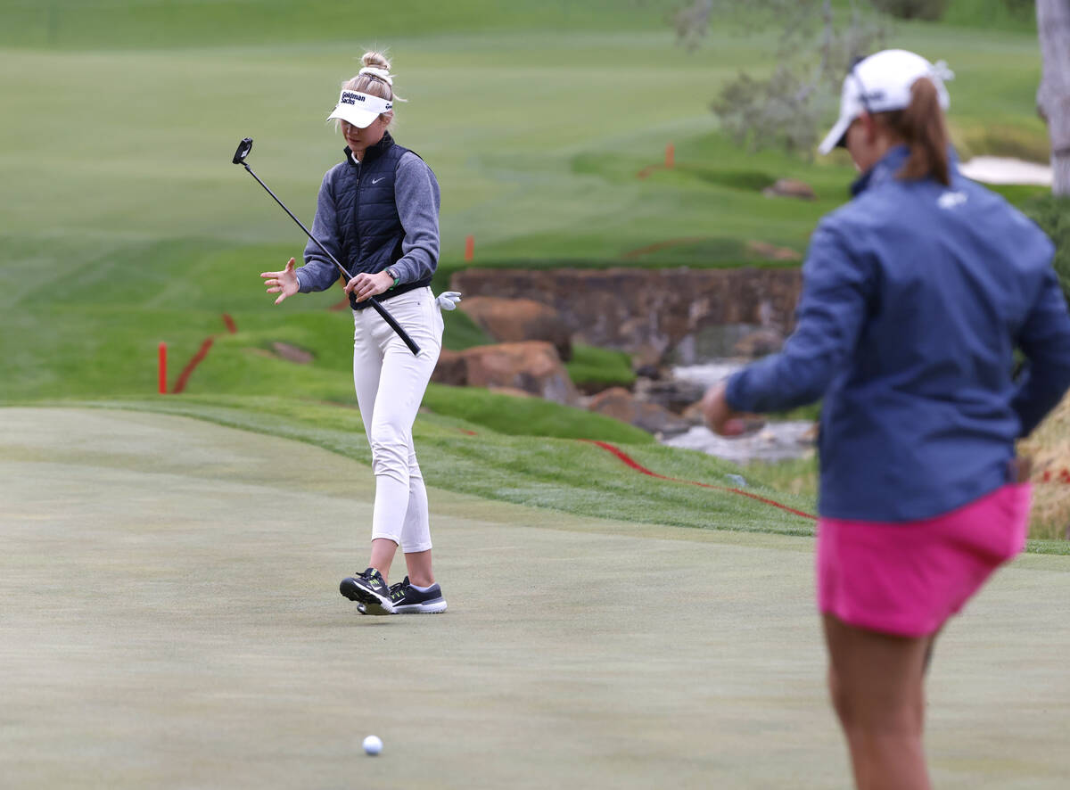 Nelly Korda, left, reacts to a missed putt as Jennifer Kupcho, both of the USA, looks on during ...