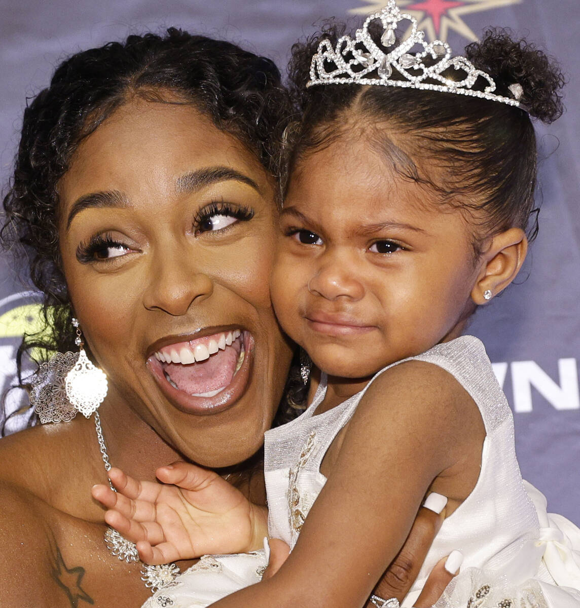 Cheyenne Parker of the Atlanta Dream poses for a photo with her daughter Naomi Tyus, 18 months, ...