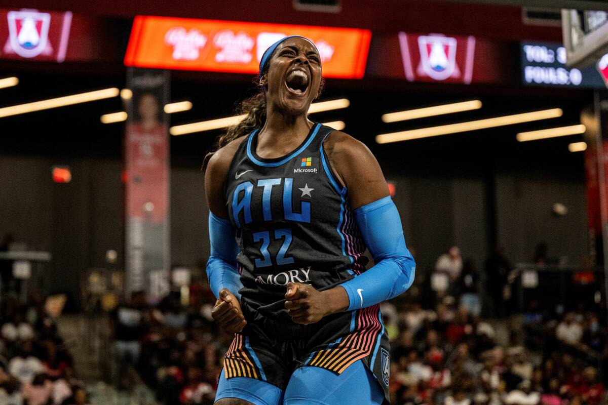 Atlanta Dream forward Cheyenne Parker (32) celebrates during a WNBA basketball game against the ...