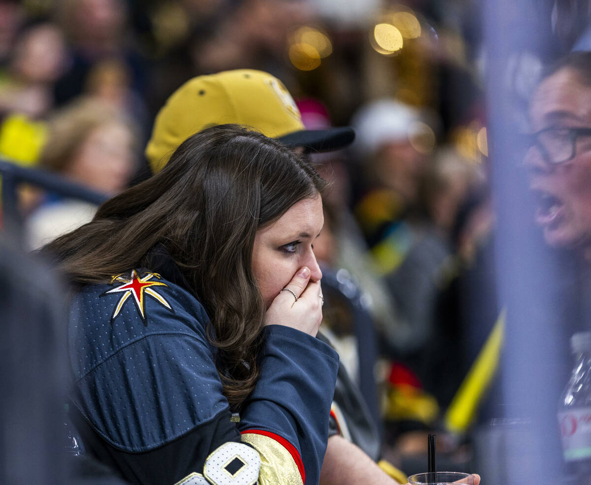 Golden Knights fans are dismayed as the Winnipeg Jets score again in the third period of their ...