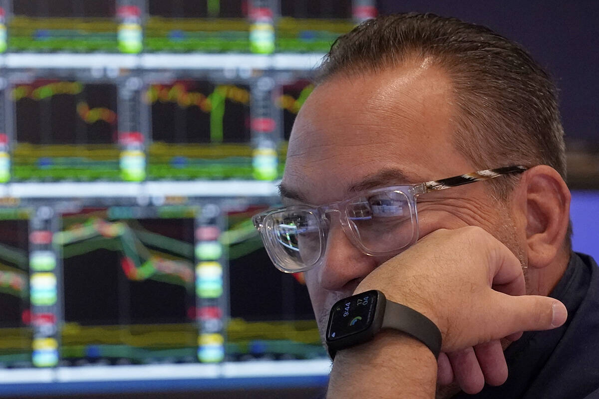 Specialist Anthony Matesic works on the floor of the New York Stock Exchange, Friday, April 4, ...