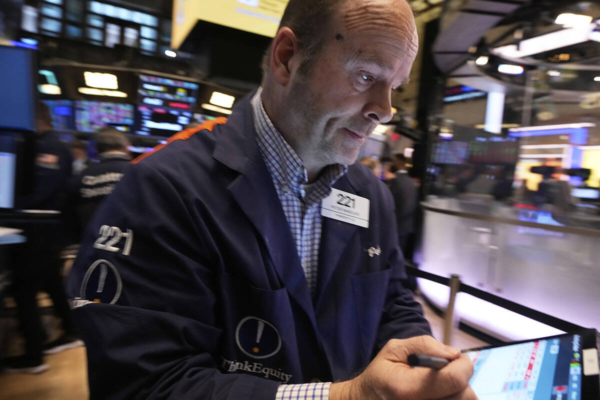 Trader Peter Mancuso works on the floor of the New York Stock Exchange, Friday, April 4, 2025. ...