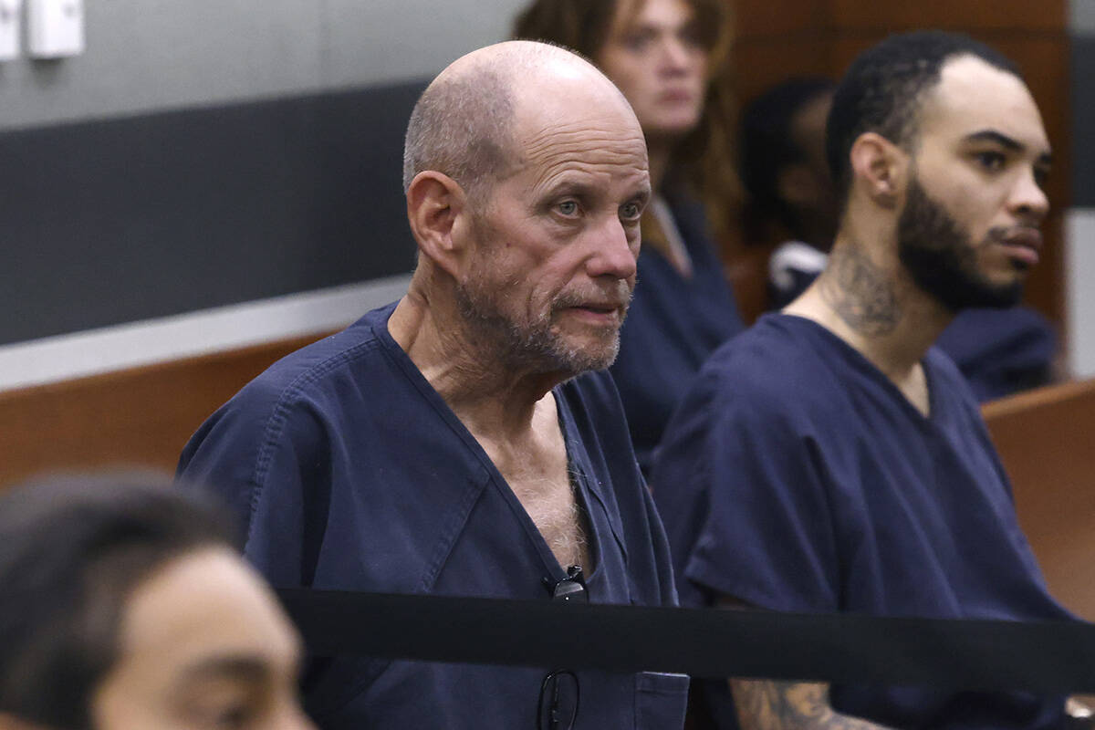 Michael Atwell, center, a volunteer coach at Palo Verde High School, who is accused for sexual ...