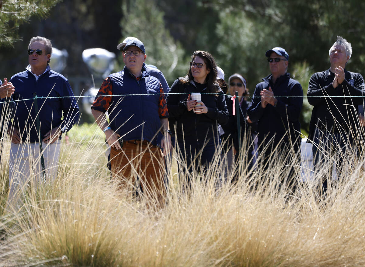 Fans follow the tee drive hit by Ruoning Yin of China during the third round of the LPGA T-Mobi ...