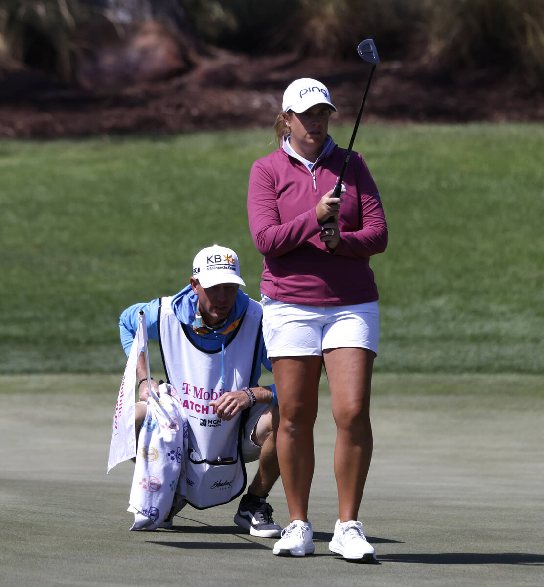 Lauren Coughlin of the USA measures up the line of play at the second hole during the third rou ...