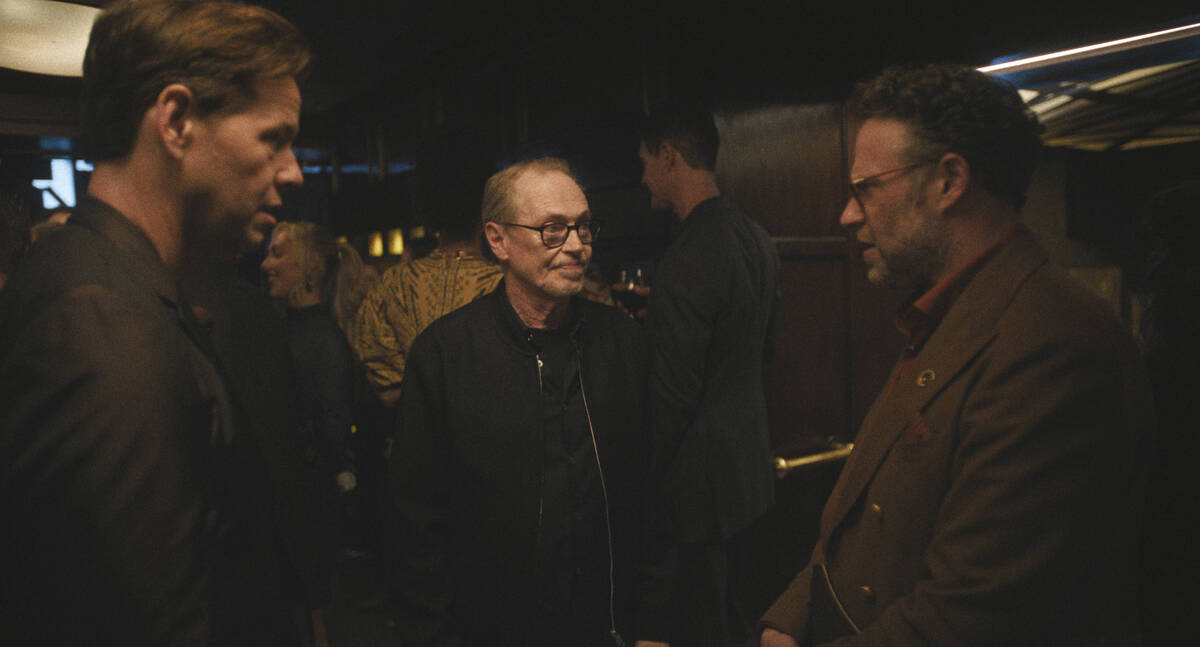 This image released by Apple TV+ shows, from left, Ike Barinholtz, Steve Buscemi, and Seth Roge ...