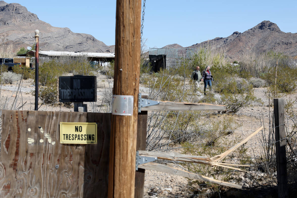 Karl Mitchell and Catherine Griffiths walk at their Pahrump home Thursday, April 3, 2025, after ...