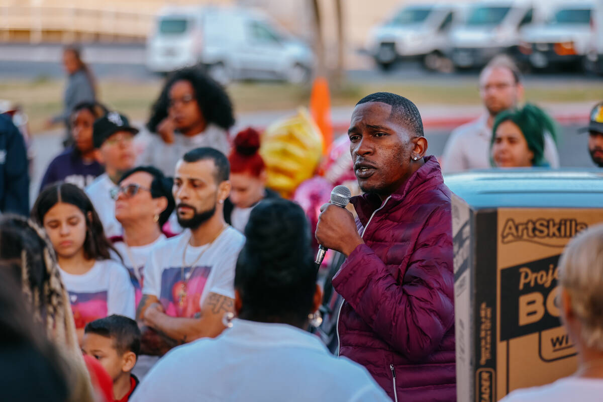 Jeremy Ross speaks about the importance of mental health at the vigil for his three-year-old da ...