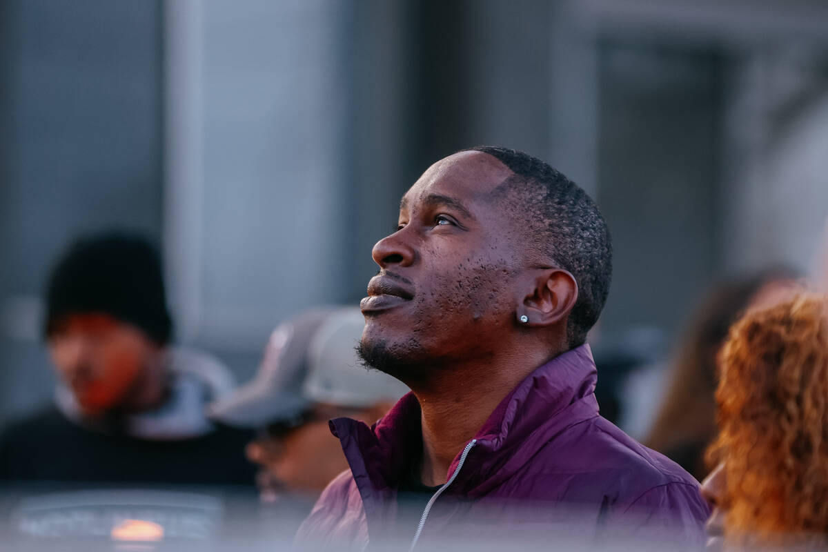 Jeremy Ross watches balloons fly into the air, commemorating his three-year-old daughter, Journ ...