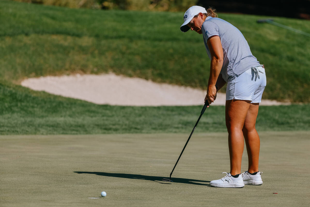 Lauren Coughlin of the United States putts the ball into the ninth hole during her quarterfinal ...