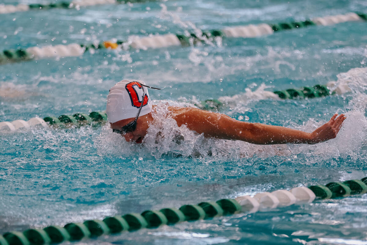 Coronado senior Addison Holmes competes in the 100-yard butterfly during the swim meet on Satur ...