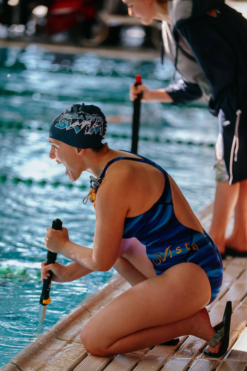 Sierra Vista team captain Danika Saxon cheers on her teammate competing in the 500-yard freesty ...