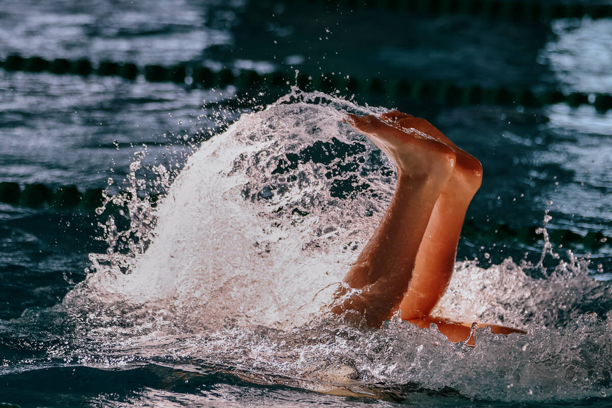 Faith Lutheran sophomore Sumer Mudadu flip turns while competing in the 500-yard freestyle duri ...