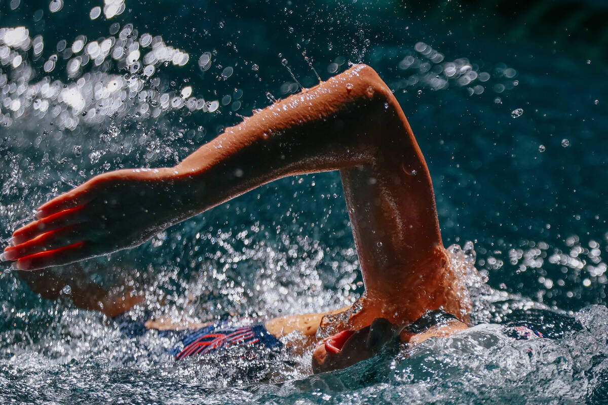 Coronado freshman Emme Gooding competes in the 100-yard backstroke during the swim meet on Satu ...