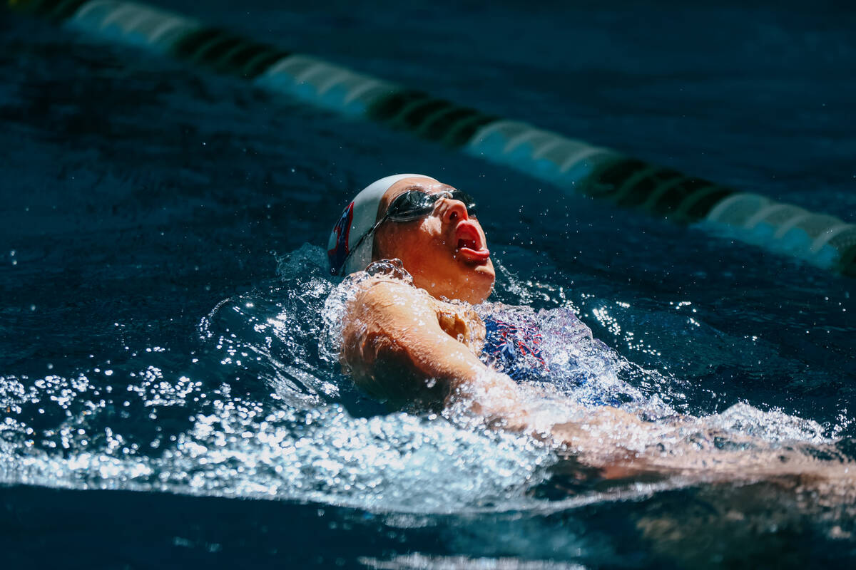 Coronado freshman Emme Gooding competes in the 100-yard backstroke during the swim meet on Satu ...