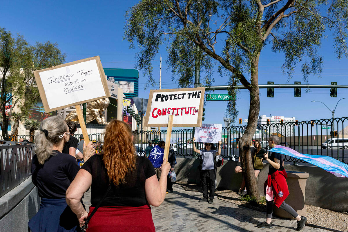 A group of demonstrators join the nationwide “Hands Off” protests against President Donald ...