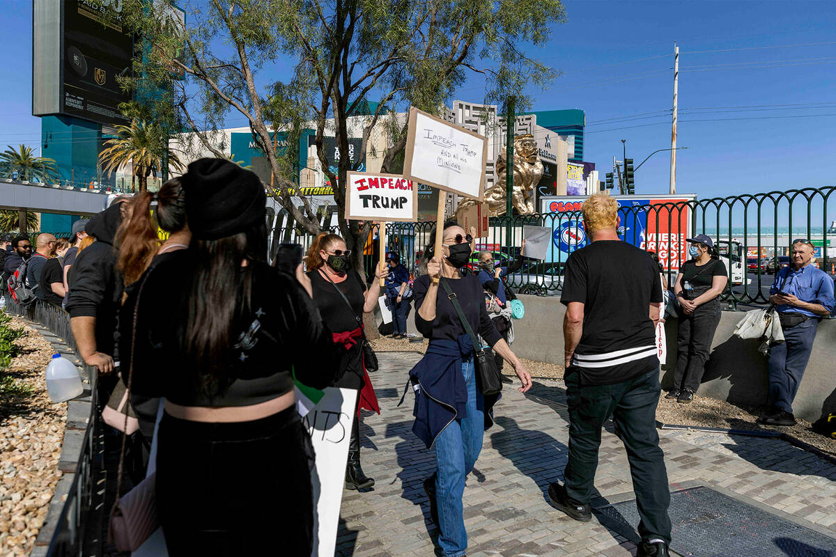 A group of demonstrators join the nationwide “Hands Off” protests against President Donald ...