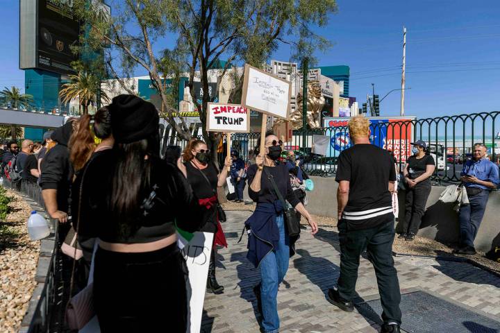 A group of demonstrators join the nationwide “Hands Off” protests against President Donald ...