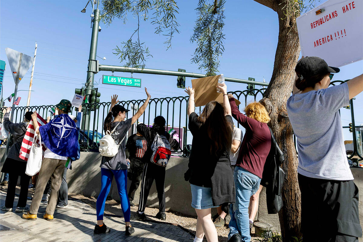 A group of demonstrators join the nationwide “Hands Off” protests against President Donald ...