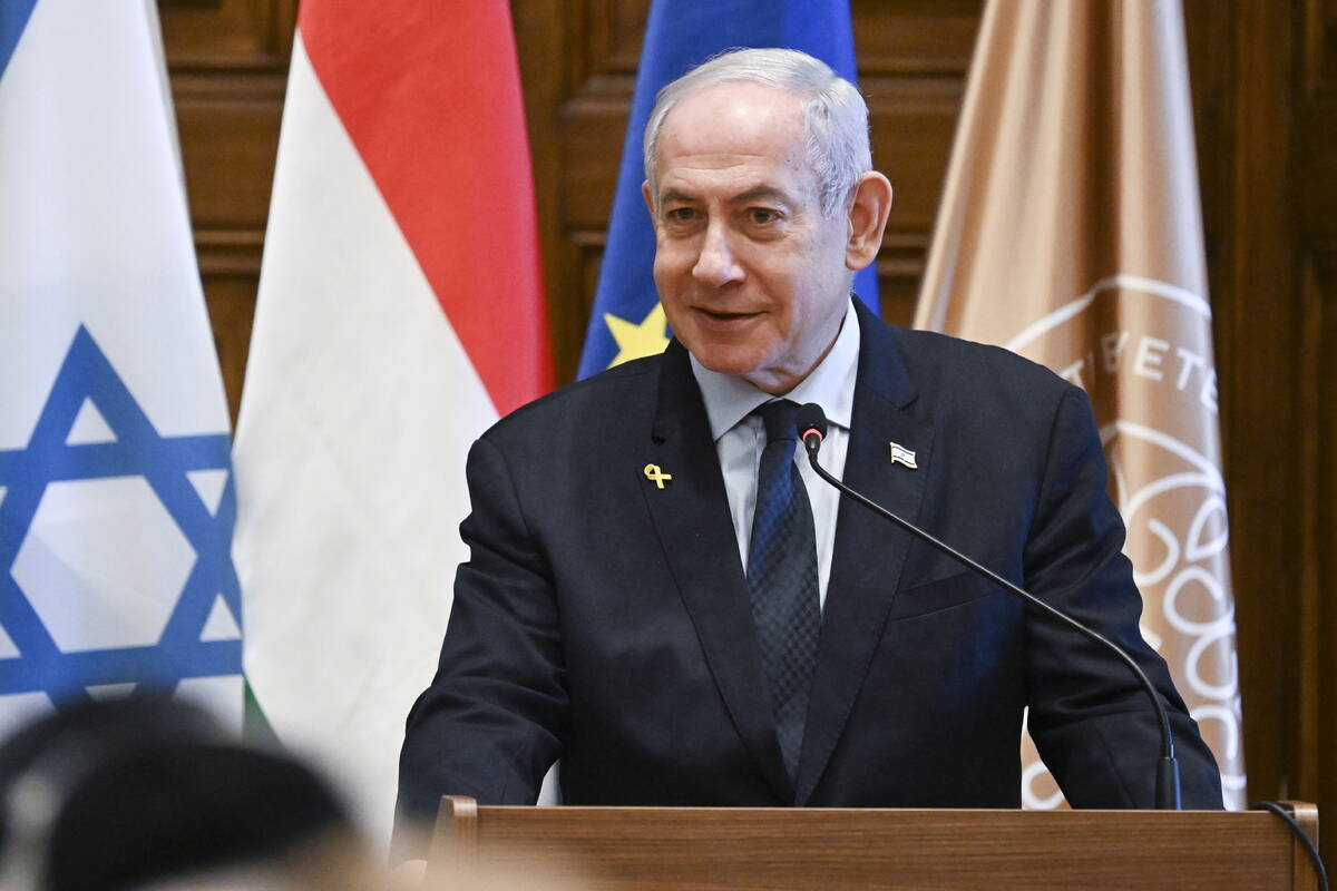 Israeli Prime Minister Benjamin Netanyahu speaks after he took over the certificate of Honorary ...