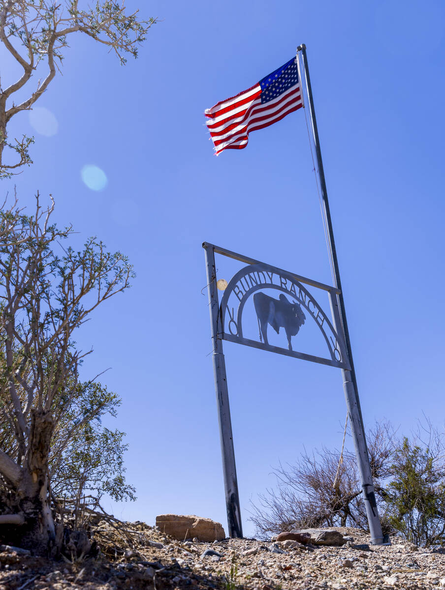 A sign and flag mark the entrance to the Bundy Ranch on Saturday, April 5, 2025, in Bunkerville ...