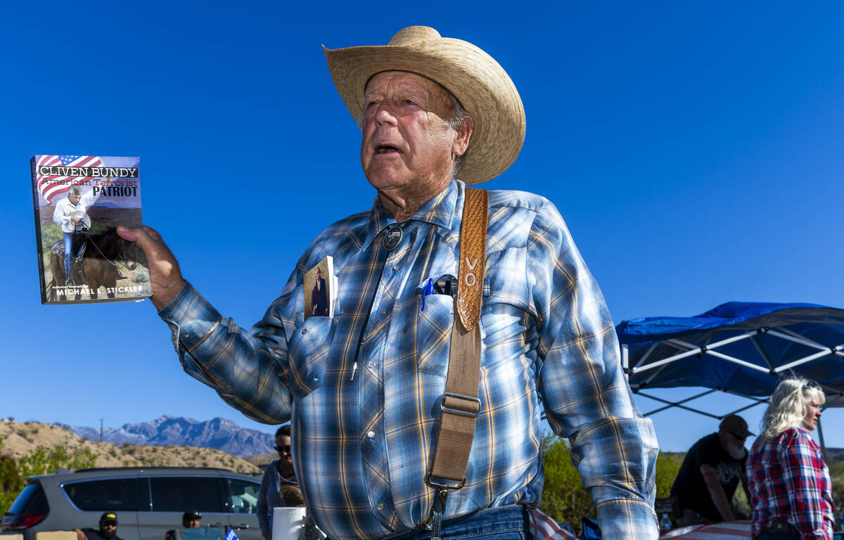 Cliven Bundy talks about one of the books written about him during a cowboy camp meal gathering ...