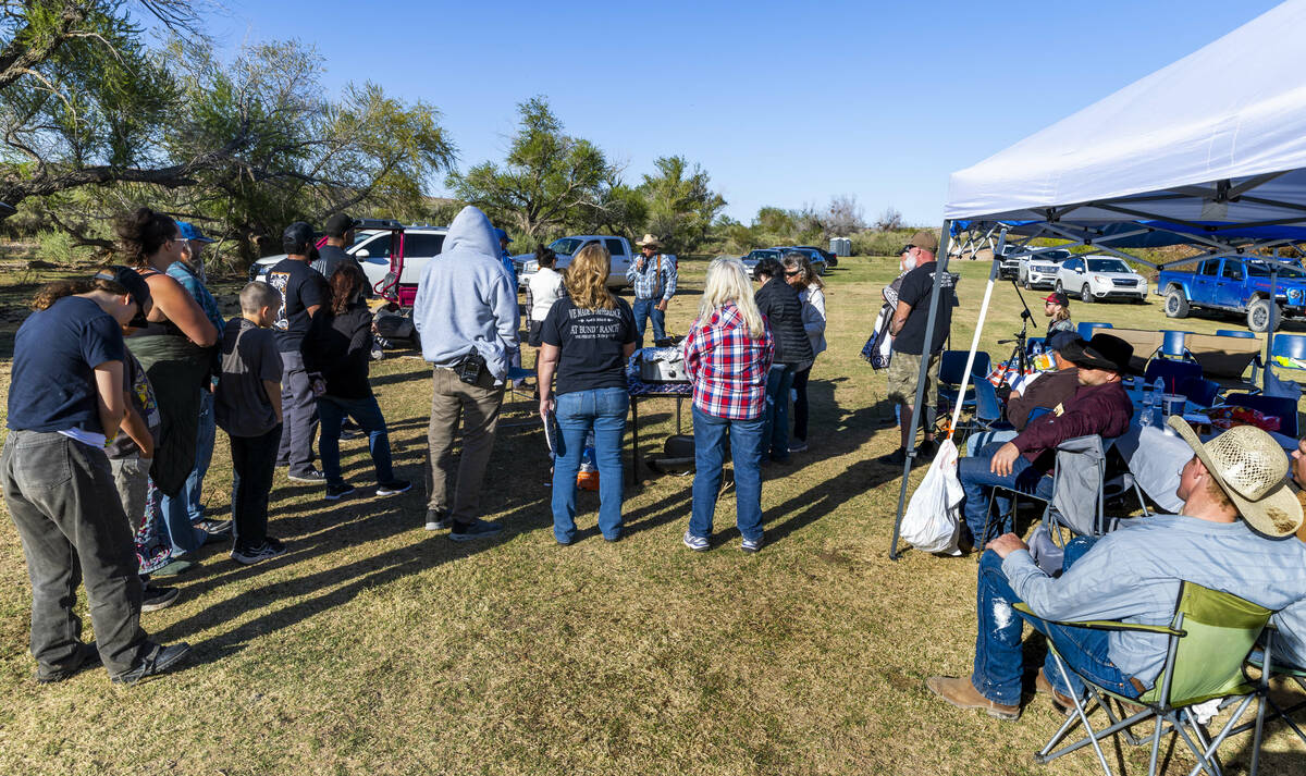 Cliven Bundy gives thanks to all who have joined him and his family during a cowboy camp meal g ...