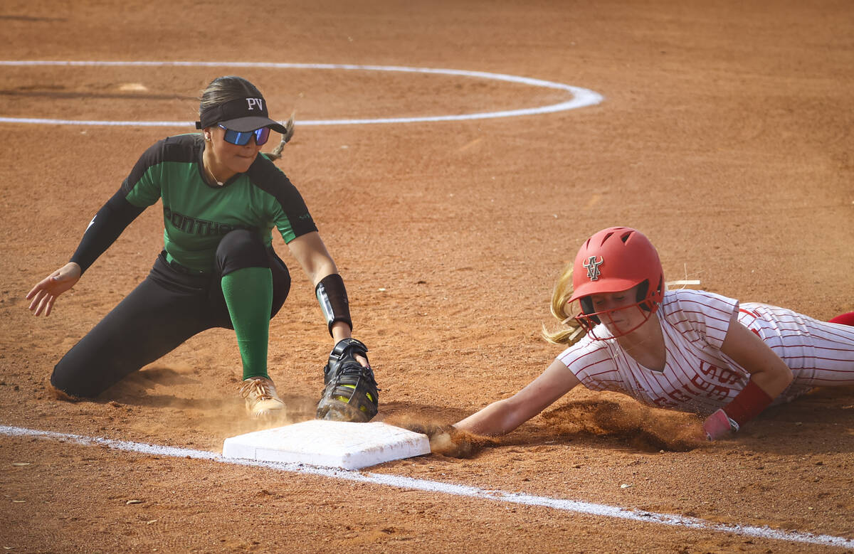 Palo Verde's Haley Kearnes (8) tries to tag out Arbor View's Kelsie Phares (39) during a softba ...