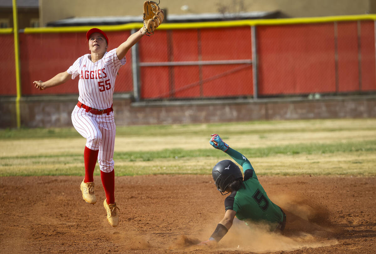 Palo Verde's Ava Cruz (5) slides into second base as Arbor View's Lilly Easton (55) comes up sh ...