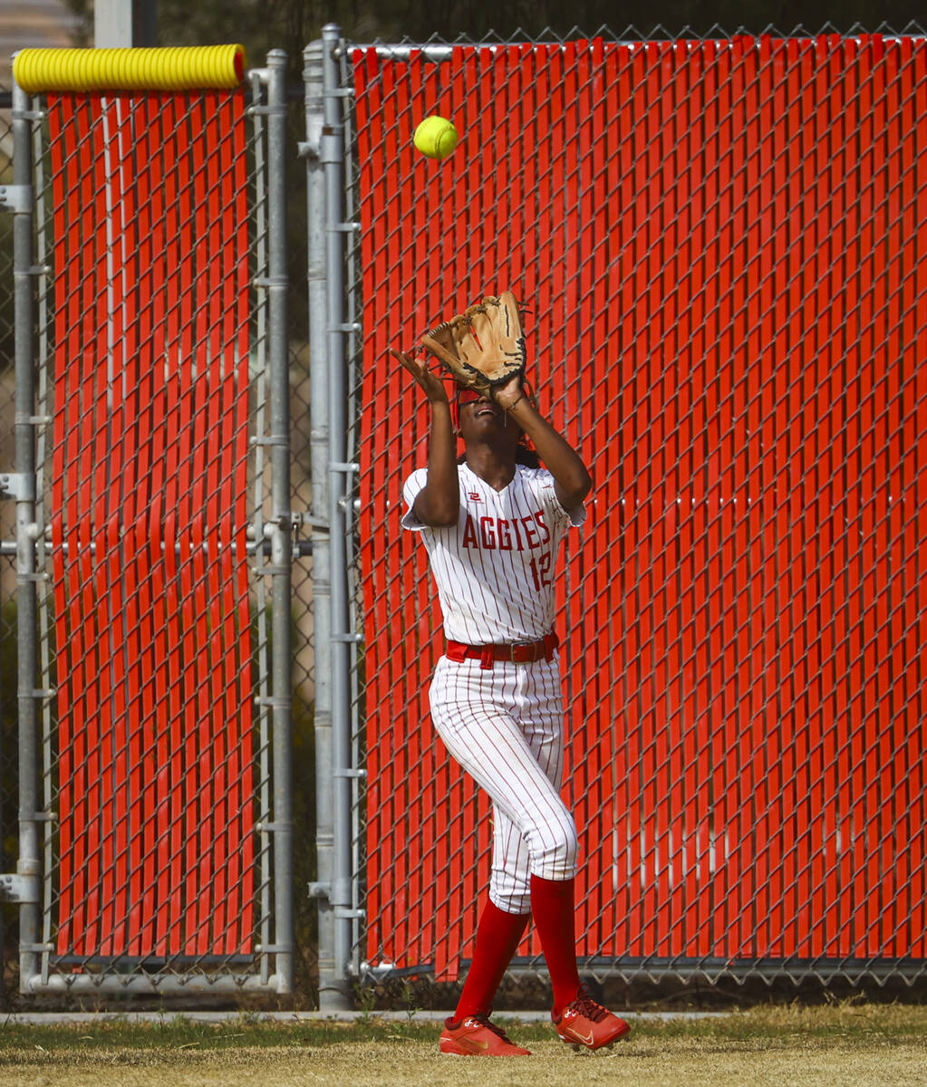 Arbor View's right fielder Malaya Tellis (12) catches a fly ball from Palo Verde during a softb ...