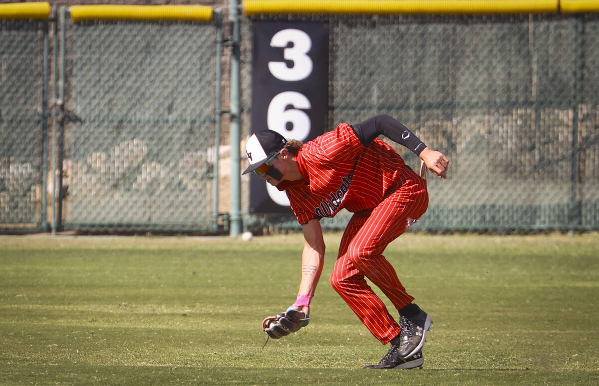 Las Vegas' Bryden Bull fields a grounder from Bishop Gorman during a baseball game at Las Vegas ...