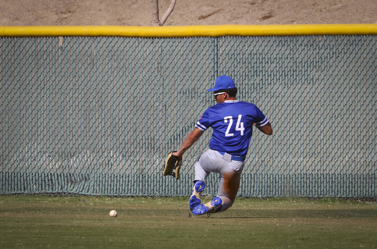 Bishop Gorman's Alex LaRosa chases after a fly ball during a baseball game at Las Vegas High Sc ...
