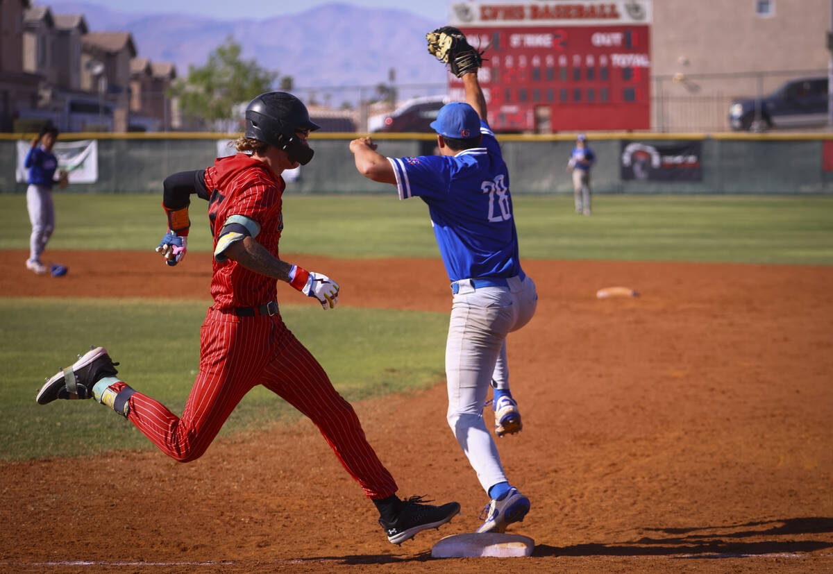 Las Vegas outfielder Bryden Bull, left, gets to first base as Bishop Gorman's Chase Wilk (28) r ...