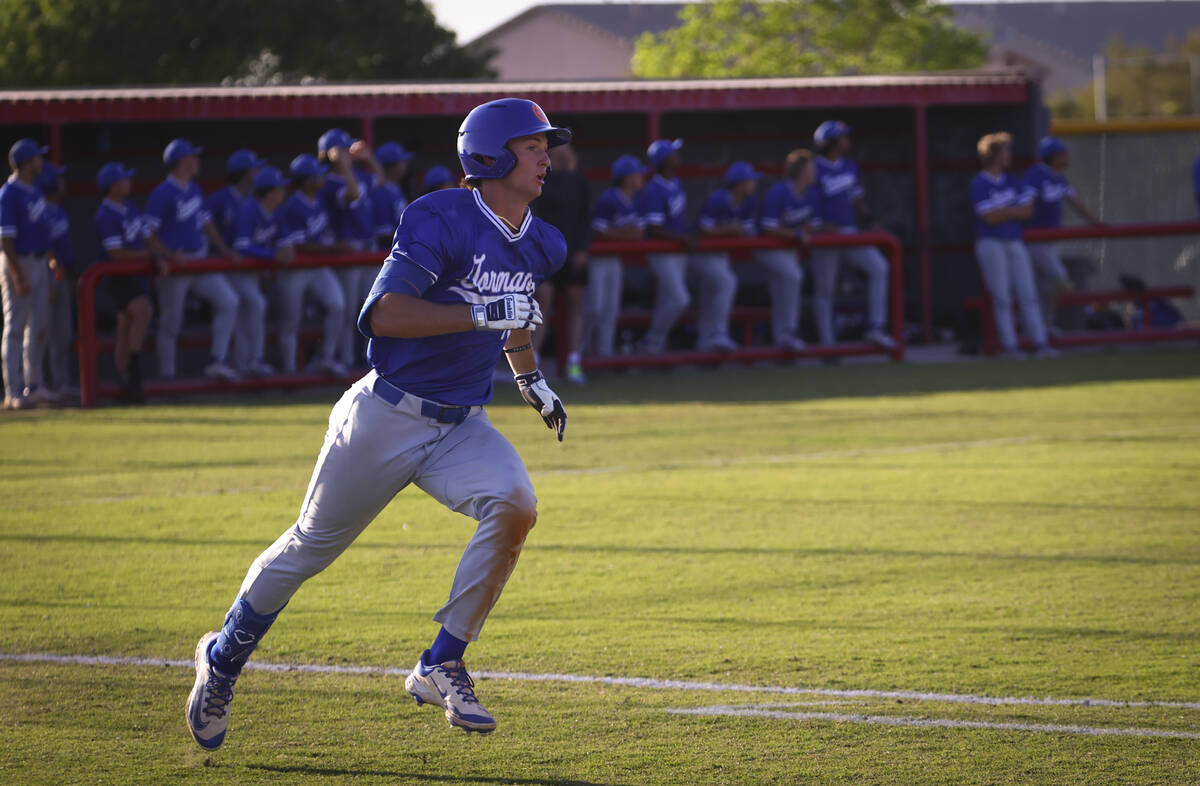 Bishop Gorman's Nolan Eberwein runs to first base during a baseball game at Las Vegas High Scho ...