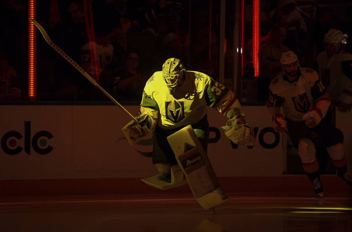 Vegas Golden Knights goalie Adin Hill skates onto the ice before an NHL hockey game against the ...