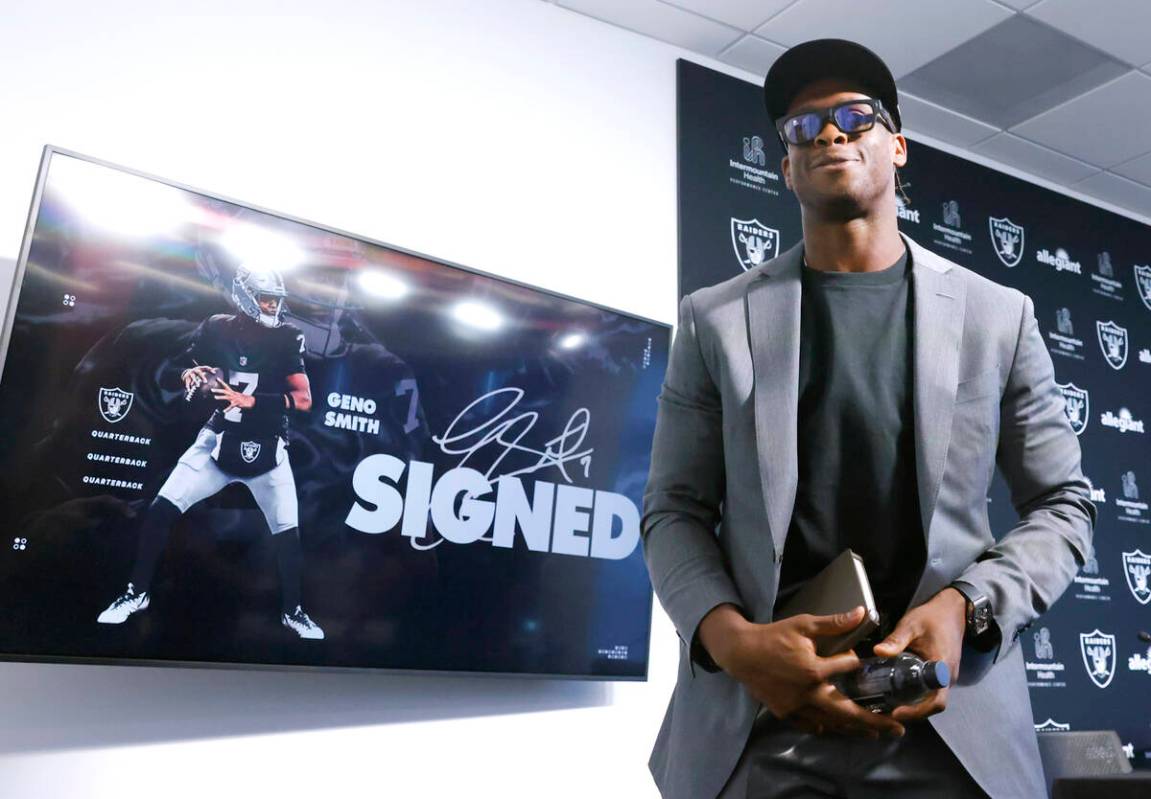 Geno Smith leaves the podium after being introduced to a media as new Raiders quarterback at th ...
