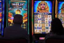 Gamblers play slot machines at the Hard Rock casino in Atlantic City, N.J., Aug. 8, 2022. (AP P ...