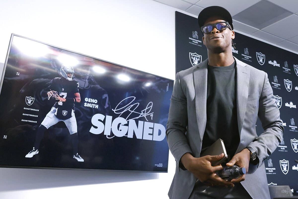 Geno Smith leaves the podium after being introduced to a media as new Raiders quarterback at th ...