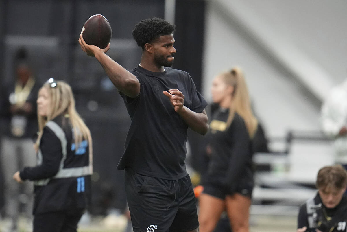 Colorado quarterback Shedeur Sanders (2) takes part in passing drills during Colorado's NFL foo ...