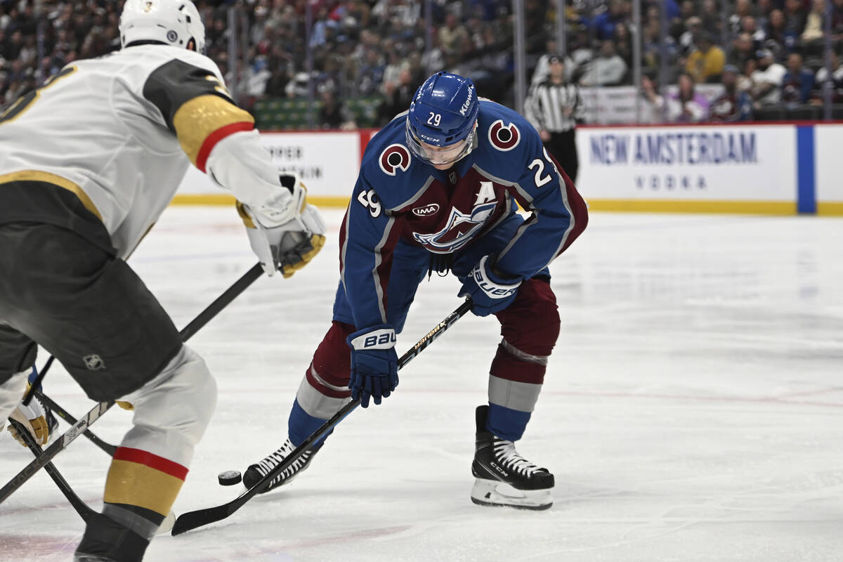 Colorado Avalanche center Nathan MacKinnon (29) skates against Vegas Golden Knights defenseman ...