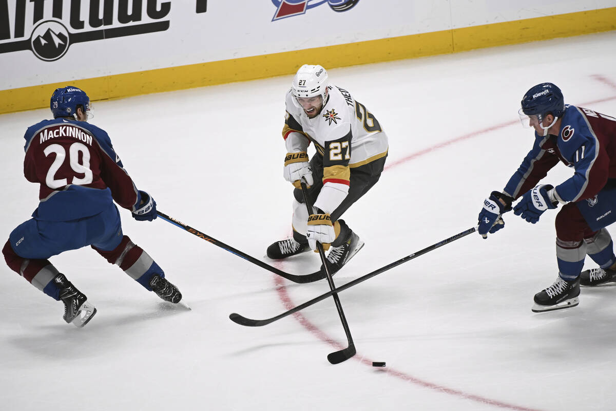 Colorado Avalanche center Nathan MacKinnon (29) and center Brock Nelson (11) skate against Vega ...