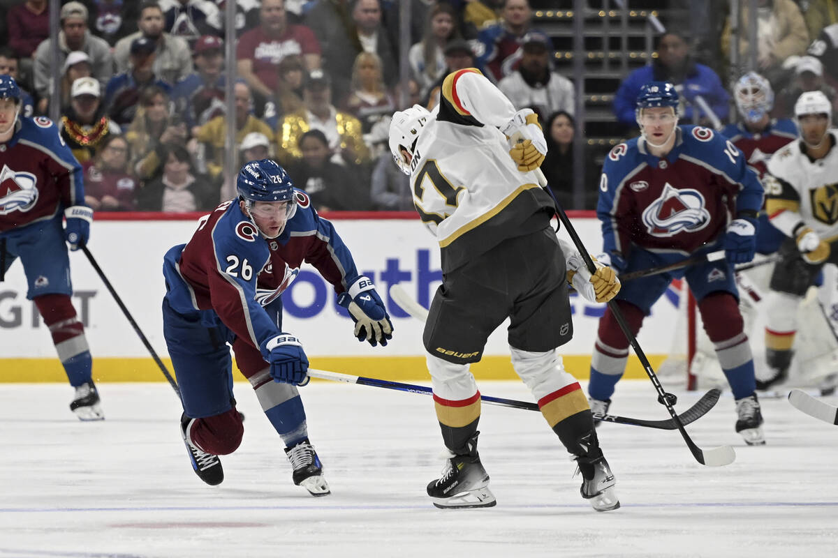 Colorado Avalanche left wing Jimmy Vesey (26) defends against Vegas Golden Knights defenseman B ...