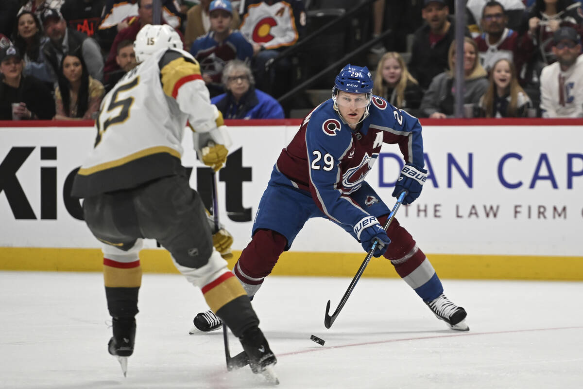 Colorado Avalanche center Nathan MacKinnon (29) skates against Vegas Golden Knights defenseman ...