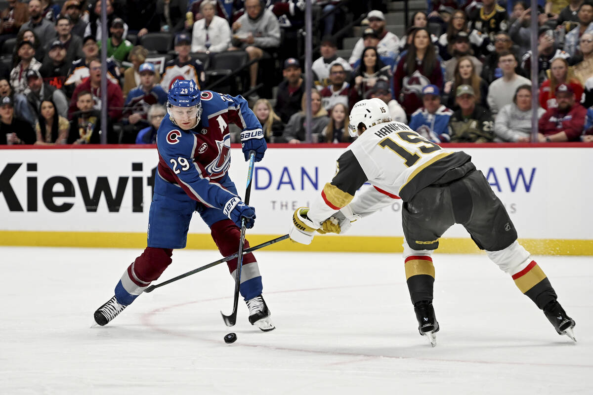 Colorado Avalanche center Nathan MacKinnon (29) skates against Vegas Golden Knights defenseman ...