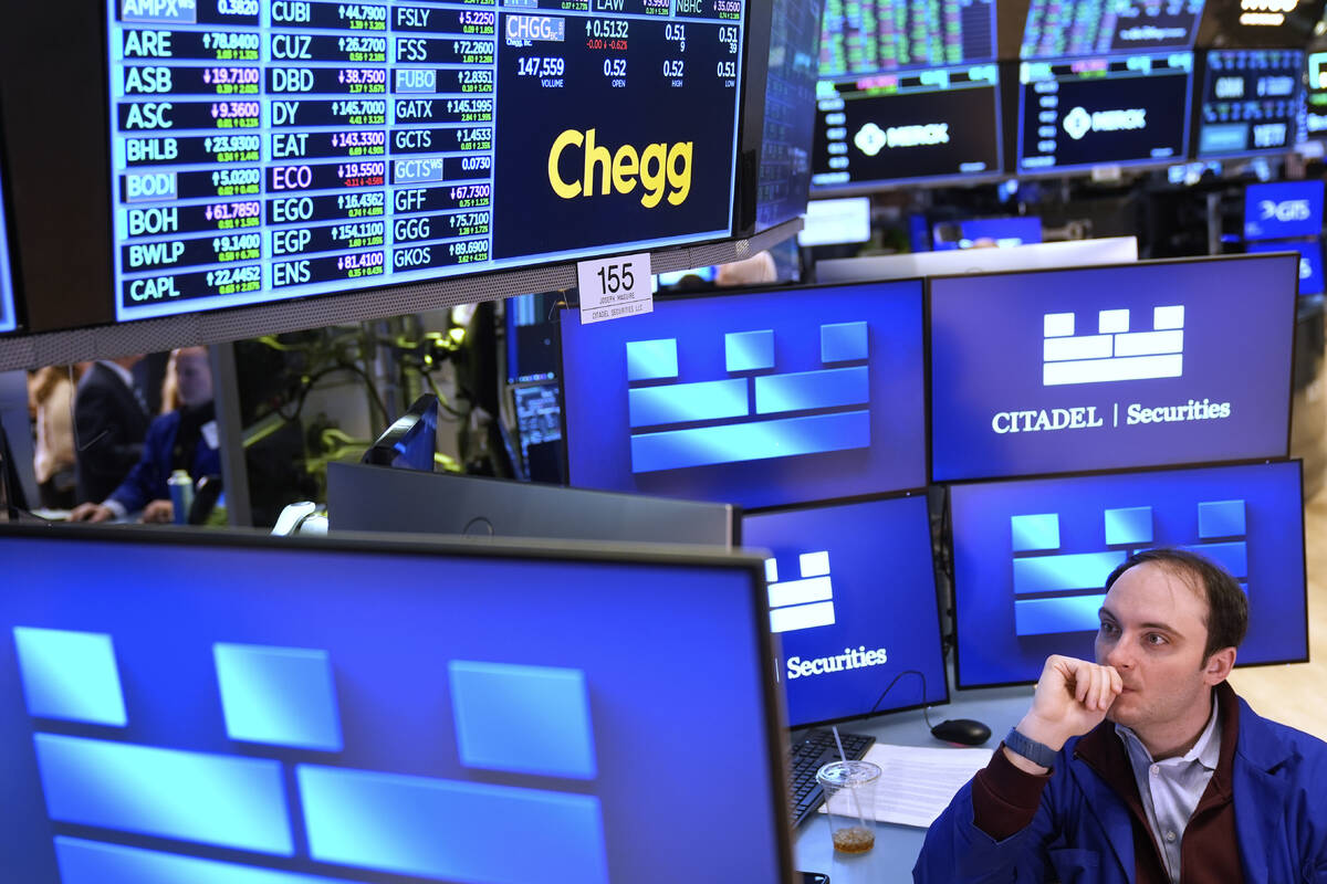 Joseph Maguire works on the floor at the New York Stock Exchange in New York, Tuesday, April 8, ...
