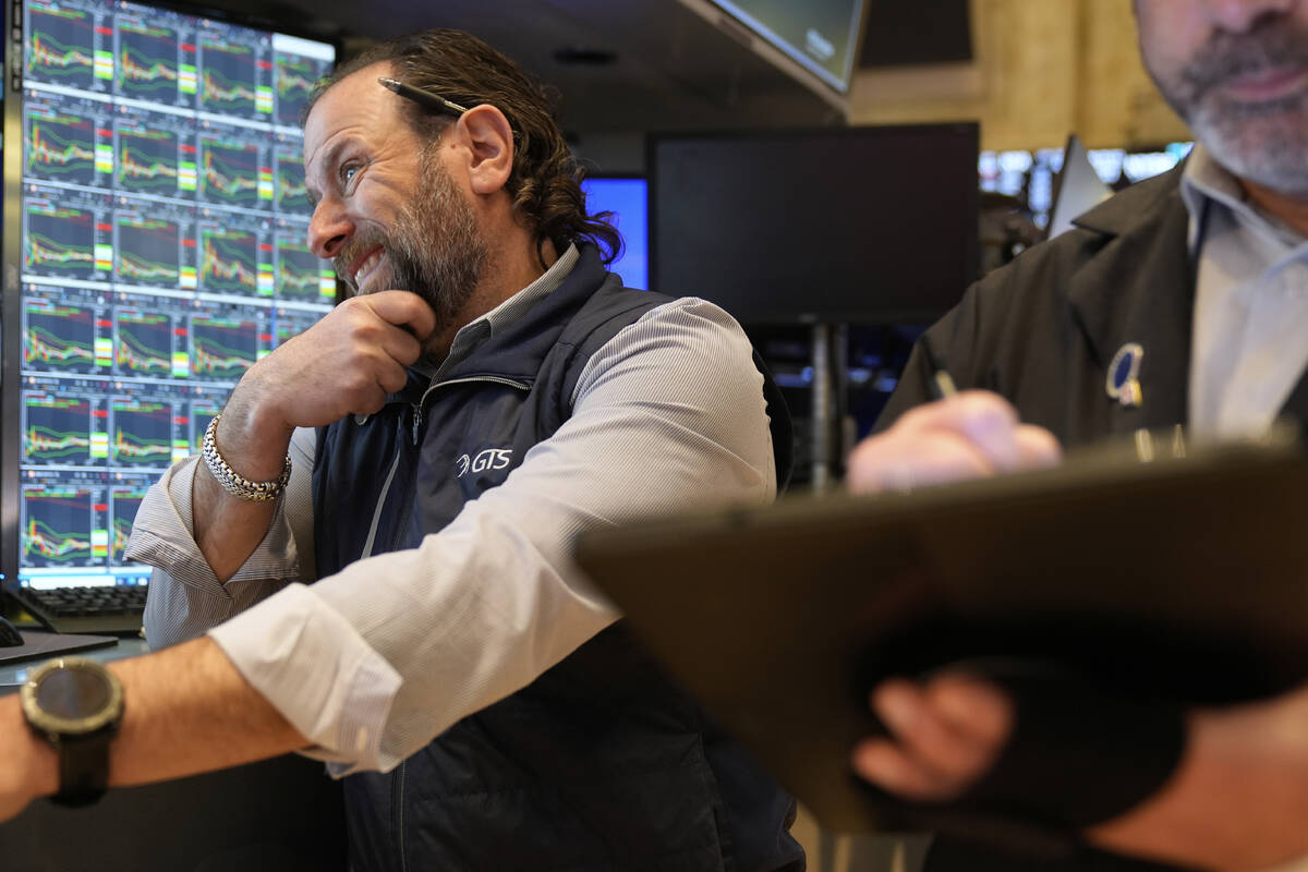 Mike Pistillo Jr. works on the floor at the New York Stock Exchange in New York, Tuesday, April ...
